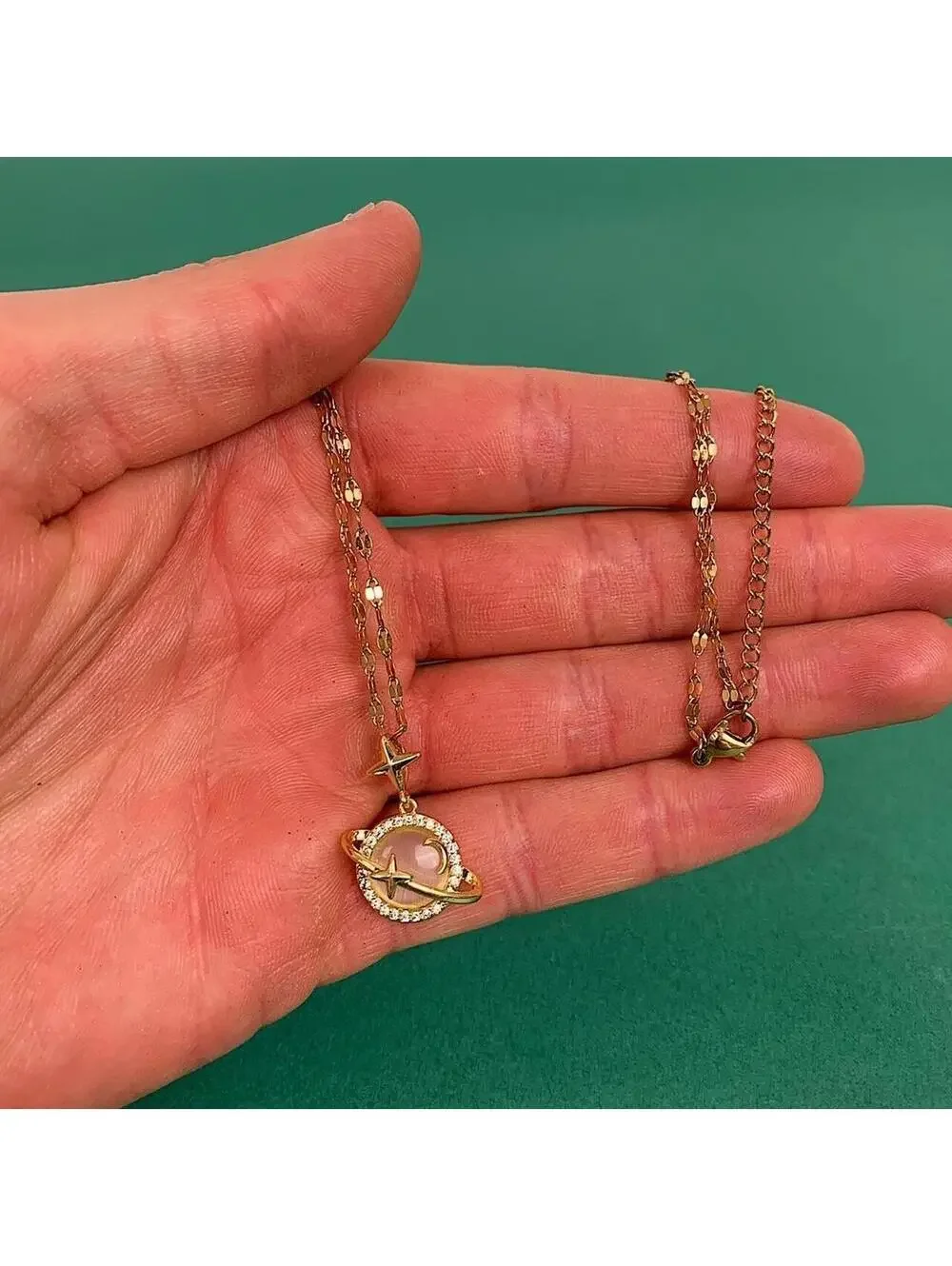 Cyber Y2k 2000s style gold opal planet pendant opium necklace. Cool design.